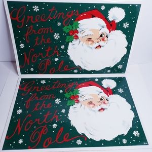Vtg Vinyl Christmas Placemats Lot of 2 Winking Santa Claus North Pole Greetings